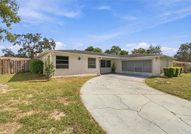 Photo 3 of Single family home for sale at 7400 Hiawatha Pkwy, Spring Hill, FL 34606 | MLS# TB8557036 | Listing updated on 2026-10-20