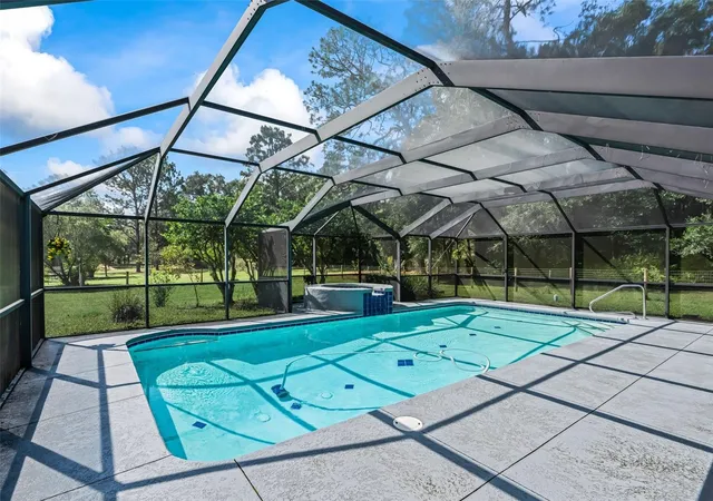 Photo 3 of Single family home for sale at 7522 NW 14th Street, Ocala, FL 34482 | MLS# OM733853 | Listing updated on 2026-10-27