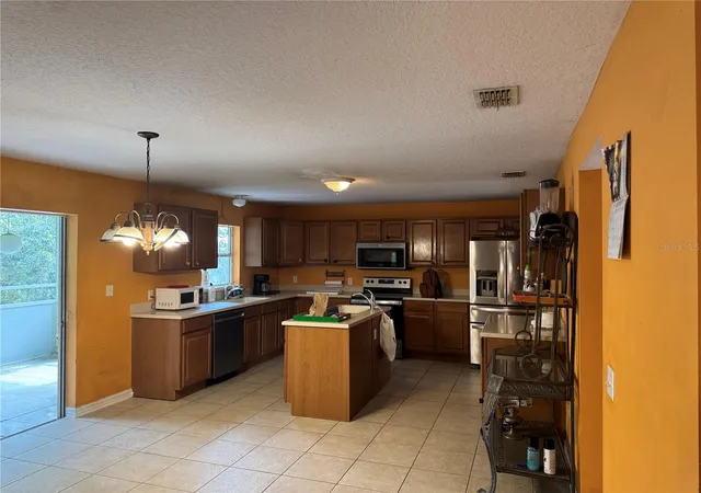 Photo 3 of Single family home for sale at 15849 Surfbird Ct, Mascotte, FL 34753 | MLS# O6449103 | Listing updated on 2026-10-20