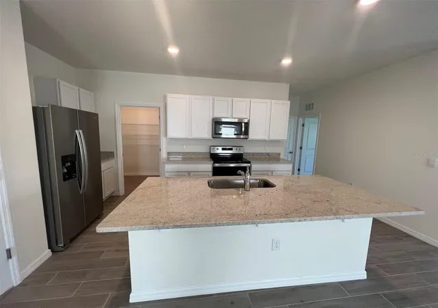 Photo 3 of Single family home for sale at 5133 SW 47th Lane, Gainesville, FL 32608 | MLS# GC544105 | Listing updated on 2026-10-16