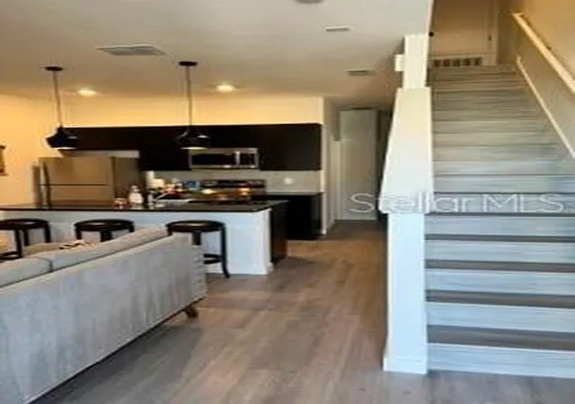 Photo 2 of Townhouse for sale at 3321 Tranquil Trl, Kissimmee, FL 34747 | MLS# O6449127 | Listing updated on 2026-10-25