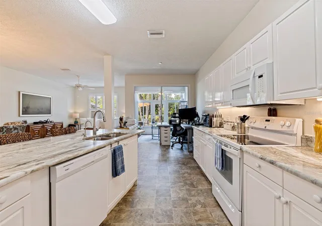 Photo 2 of Townhouse for sale at 3022 Pepperwood Ln W, Clearwater, FL 33761 | MLS# TB8557156 | Listing updated on 2026-10-17