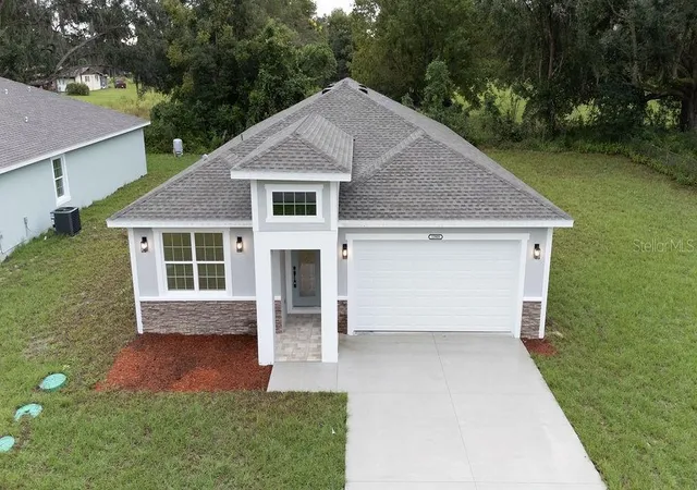 Single family home for sale at 13909 SE 53rd Terrace, SUMMERFIELD, FL 34491 | MLS# OM733883