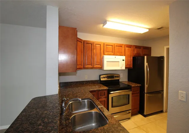 Photo 4 of Condo for sale at 7511 Seurat St #10106, Orlando, FL 32819 | MLS# O6449221 | Listing updated on 2026-10-19