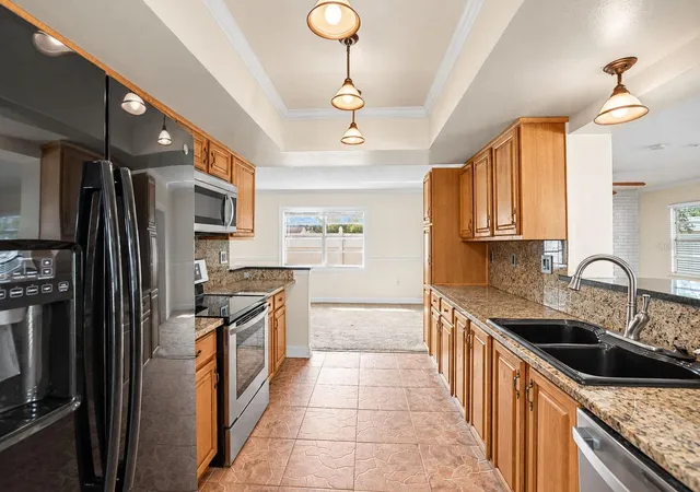 Photo 2 of Single family home for sale at 2200 Stacy Ct, Dunedin, FL 34698 | MLS# TB8557237 | Listing updated on 2026-10-13