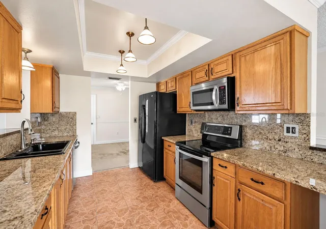 Photo 3 of Single family home for sale at 2200 Stacy Ct, Dunedin, FL 34698 | MLS# TB8557237 | Listing updated on 2026-10-13