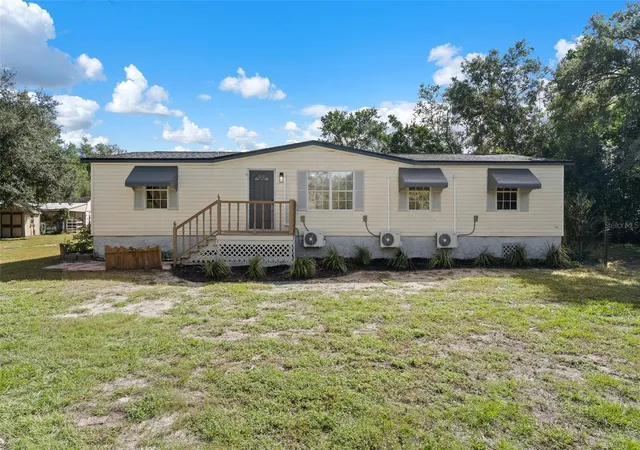 Photo 1 of Manufactured home for sale at 18446 Edgewood Dr, Spring Hill, FL 34610 | MLS# W7890262 | Listing updated on 2026-10-29