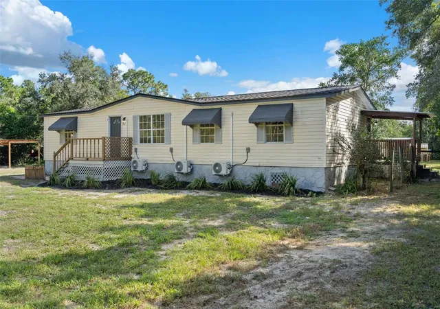 Photo 3 of Manufactured home for sale at 18446 Edgewood Dr, Spring Hill, FL 34610 | MLS# W7890262 | Listing updated on 2026-10-29