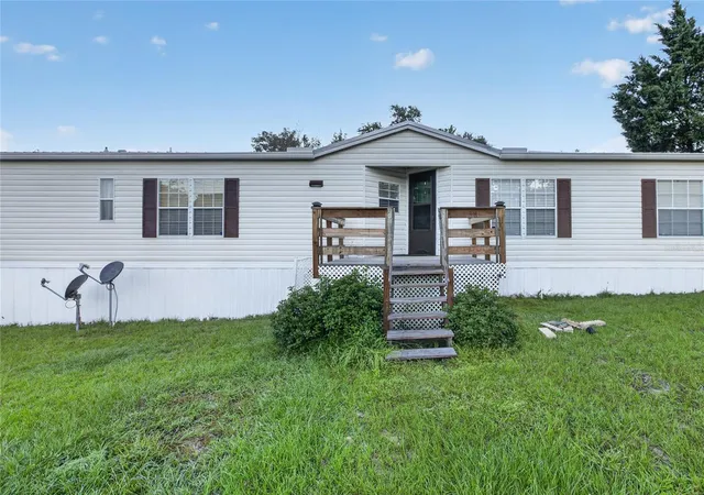Manufactured home for sale at 7990 Floral Ridge Cir, KEYSTONE HEIGHTS, FL 32656 | MLS# GC544121