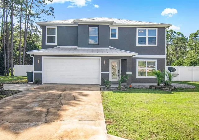 Photo 1 of Single family home for sale at 61 Reidsville Dr, Palm Coast, FL 32164 | MLS# FC322068 | Listing updated on 2026-10-24