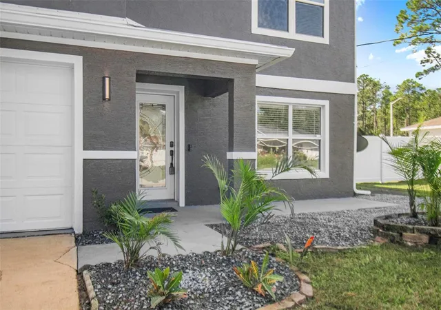 Photo 3 of Single family home for sale at 61 Reidsville Dr, Palm Coast, FL 32164 | MLS# FC322068 | Listing updated on 2026-10-24