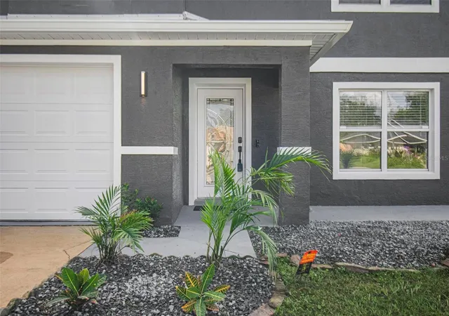 Photo 3 of Single family home for sale at 61 Reidsville Dr, Palm Coast, FL 32164 | MLS# FC322068 | Listing updated on 2026-10-24