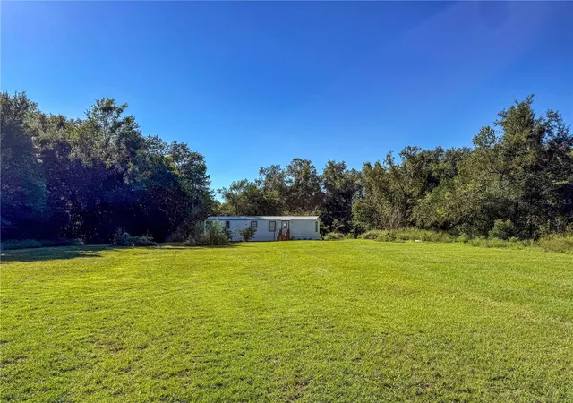 Photo 1 of Manufactured home for sale at 24325 Sw 46th Avenue, Newberry, FL 32669 | MLS# GC544125 | Listing updated on 2026-10-14