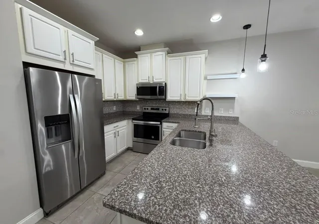Photo 4 of Townhouse for sale at 2613 Play Hard Aly, Kissimmee, FL 34744 | MLS# S5159386 | Listing updated on 2026-10-20