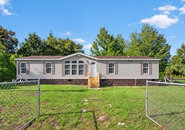 Photo 2 of Manufactured home for sale at 21330 Nw 106th Court Rd, Micanopy, FL 32667 | MLS# GC544126 | Listing updated on 2026-10-17