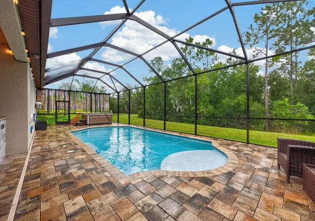 Photo 2 of Single family home for sale at 18431 Cortes Crk Blvd, Spring Hill, FL 34610 | MLS# TB8557354 | Listing updated on 2026-10-18
