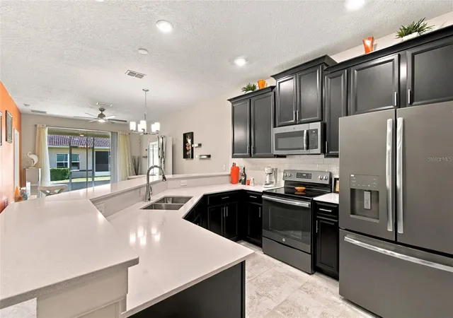 Photo 4 of Townhouse for sale at 1071 Quaker Ridge Ln, Davenport, FL 33896 | MLS# A4709328 | Listing updated on 2026-10-20