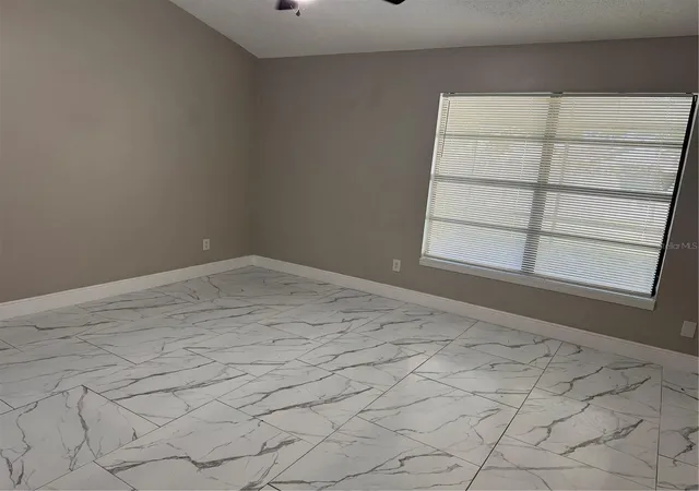 Photo 4 of Single family home for sale at 7507 Covedale Dr, Orlando, FL 32818 | MLS# O6449377 | Listing updated on 2026-10-14