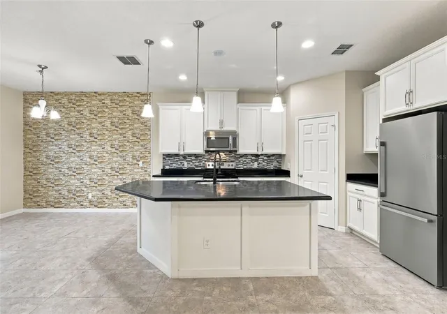 Photo 3 of Single family home for sale at 12061 Sawgrass Reserve Blvd, Orlando, FL 32824 | MLS# V4951791 | Listing updated on 2026-10-16