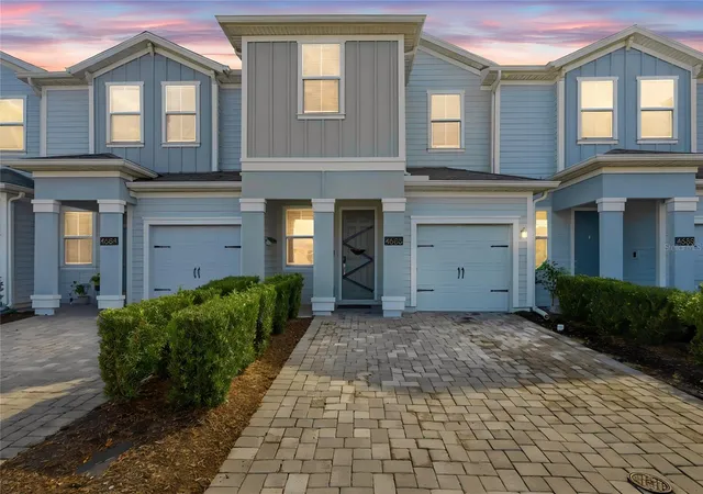Photo 1 of Townhouse for sale at 4686 Tribute Trl, Kissimmee, FL 34746 | MLS# O6449387 | Listing updated on 2026-10-14