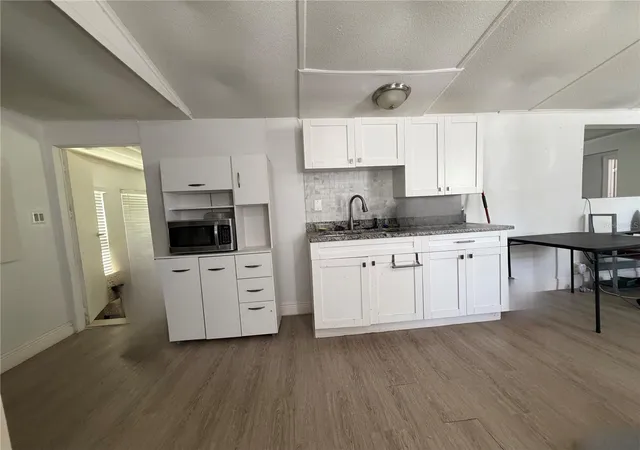 Photo 2 of Manufactured home for sale at 17327 Trojantown Dr, Spring Hill, FL 34610 | MLS# TB8557467 | Listing updated on 2026-10-13