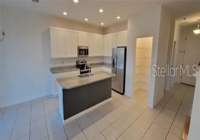 Photo 2 of Single family home for sale at 109 Trinity Ridge Cir, Davenport, FL 33897 | MLS# K4903867 | Listing updated on 2026-10-13