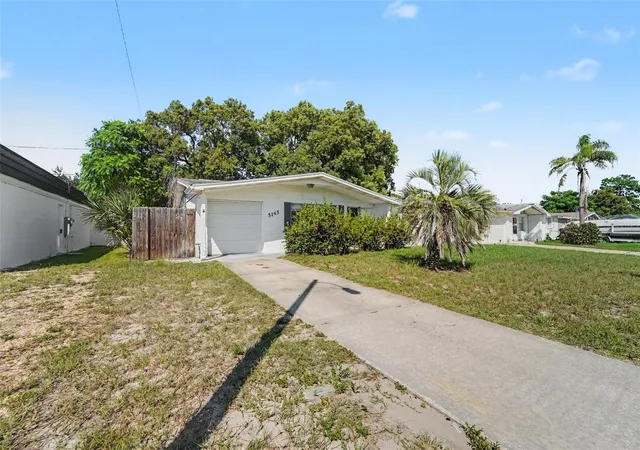 Photo 1 of Single family home for sale at 5145 Manor Dr, New Port Richey, FL 34652 | MLS# TB8557506 | Listing updated on 2026-10-14