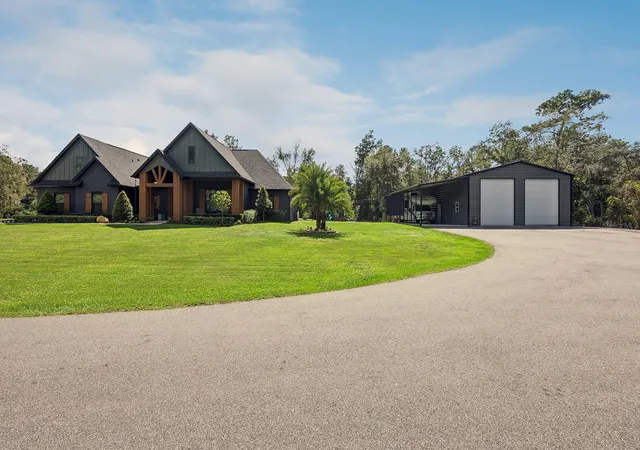 Photo 2 of Single family home for sale at 412 Snow Hl Rd, Geneva, FL 32732 | MLS# O6449464 | Listing updated on 2026-10-22