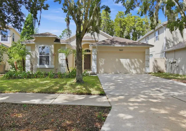 Photo 1 of Single family home for sale at 7627 Blue Spring Dr, Land O Lakes, FL 34637 | MLS# O6449474 | Listing updated on 2026-10-20
