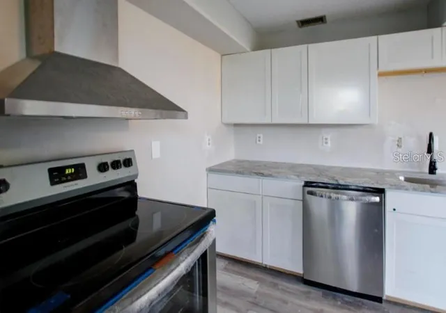 Photo 2 of Townhouse for sale at 1106 Country Clb Ln, Lakeland, FL 33801 | MLS# TB8557578 | Listing updated on 2026-10-14