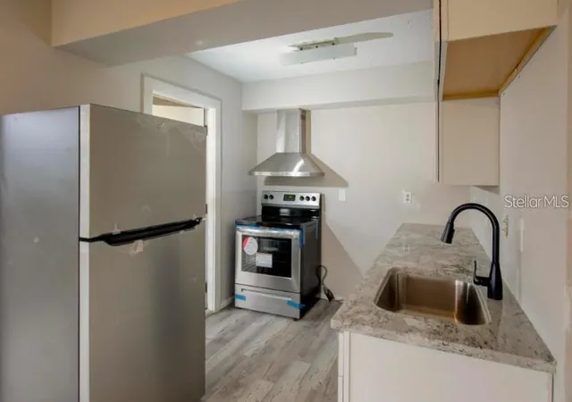 Photo 3 of Townhouse for sale at 1106 Country Clb Ln, Lakeland, FL 33801 | MLS# TB8557578 | Listing updated on 2026-10-14