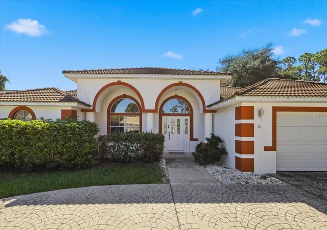 Photo 1 of Single family home for sale at 22 Bassett Ln, Palm Coast, FL 32137 | MLS# FC322090 | Listing updated on 2026-10-15