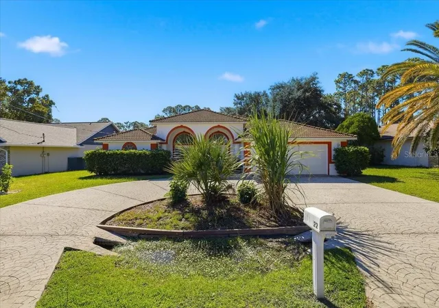 Photo 2 of Single family home for sale at 22 Bassett Ln, Palm Coast, FL 32137 | MLS# FC322090 | Listing updated on 2026-10-15