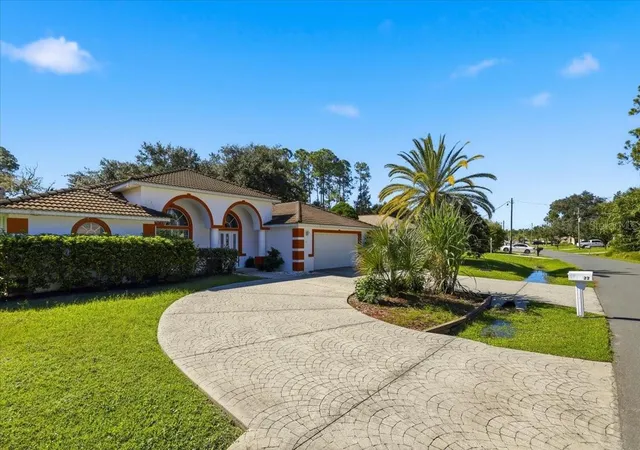 Photo 3 of Single family home for sale at 22 Bassett Ln, Palm Coast, FL 32137 | MLS# FC322090 | Listing updated on 2026-10-15