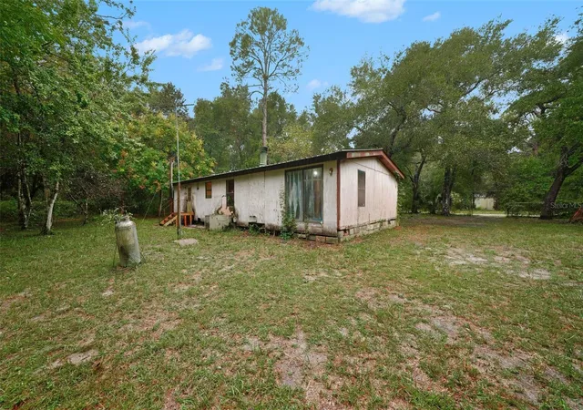 Photo 2 of Manufactured home for sale at 114 Shady Oak Dr, Satsuma, FL 32189 | MLS# TB8557670 | Listing updated on 2026-10-14