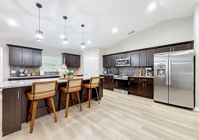 Photo 1 of Single family home for sale at 221 Ave P NW, Winter Haven, FL 33881 | MLS# O6449573 | Listing updated on 2026-10-16