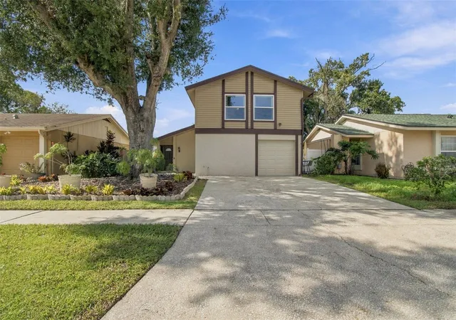 Photo 1 of Single family home for sale at 4830 Grv Point Dr, Tampa, FL 33624 | MLS# TB8557721 | Listing updated on 2026-10-25