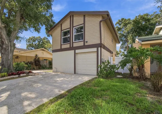 Photo 4 of Single family home for sale at 4830 Grv Point Dr, Tampa, FL 33624 | MLS# TB8557721 | Listing updated on 2026-10-25