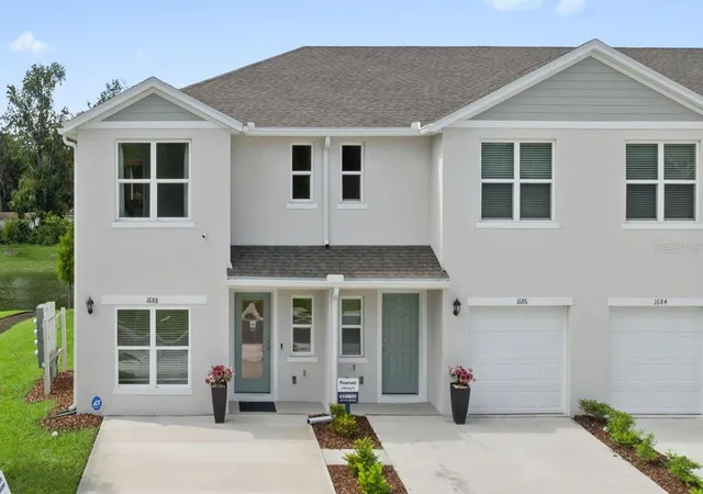Photo 1 of Townhouse for sale at 1630 Great Osprey Way, New Smyrna Beach, FL 32168 | MLS# O6449609 | Listing updated on 2026-10-14