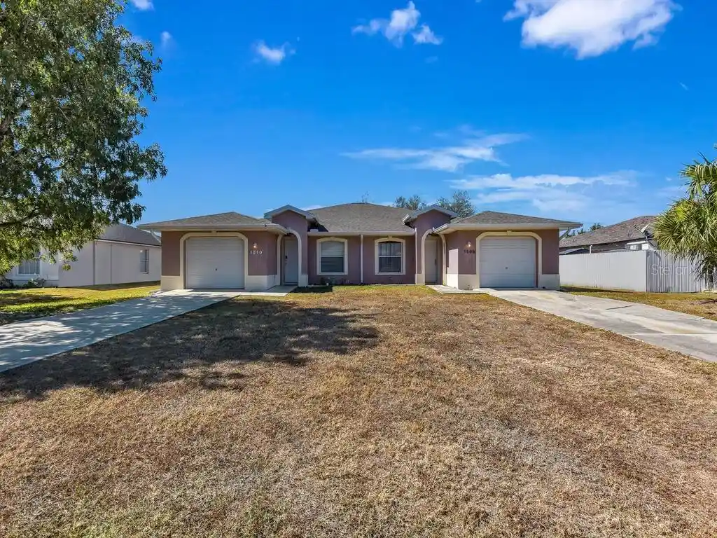 Listing Photo 1 - Condo for sale in 1208/1210 SE 24th Ave located at 1208/1210 SE 24th Ave, CAPE CORAL, FL 33990 - Unit 1208/1210 SE 24th Avenue