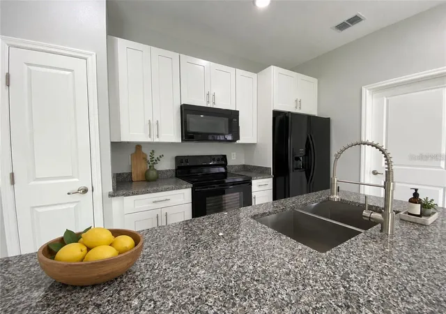 Photo 2 of Single family home for sale at 853 Trina Ln, Lakeland, FL 33809 | MLS# S5159468 | Listing updated on 2026-10-15