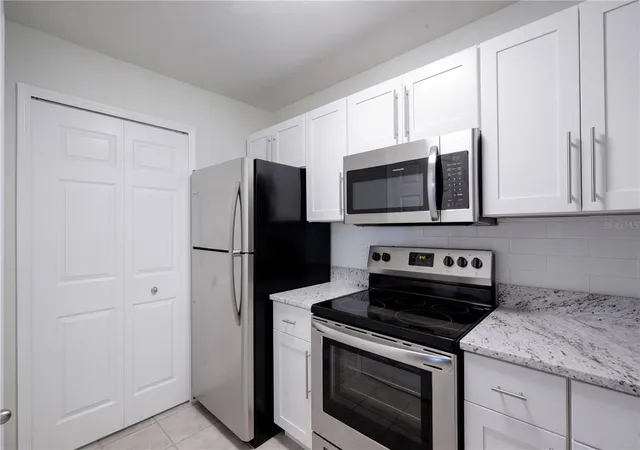 Photo 1 of Condo for sale at 8825 Latrec Ave #6105, Orlando, FL 32819 | MLS# O6449660 | Listing updated on 2026-10-20