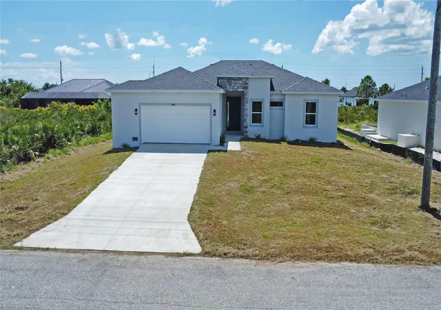 Photo 1 of Single family home for sale at 13565 Jeronimo Ln, Port Charlotte, FL 33981 | MLS# O6449698 | Listing updated on 2026-10-17