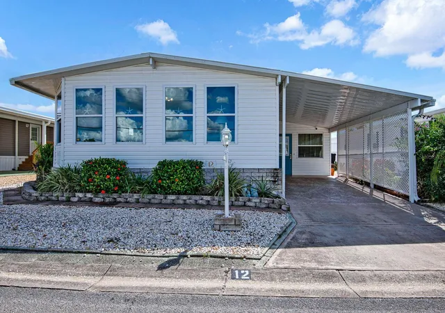 Manufactured home for sale at 2107 Palma Sola Blvd #12, Bradenton, FL 34209 | MLS# A4709494 | Listing updated on 2026-10-22