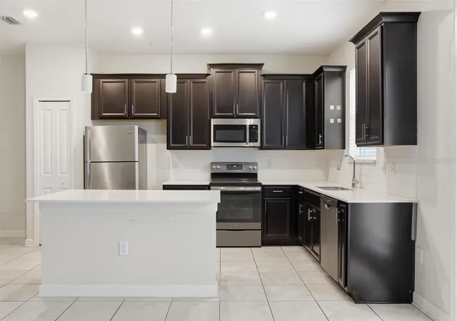 Photo 3 of Townhouse for sale at 4767 Tribute Trl, Kissimmee, FL 34746 | MLS# O6449724 | Listing updated on 2026-10-16