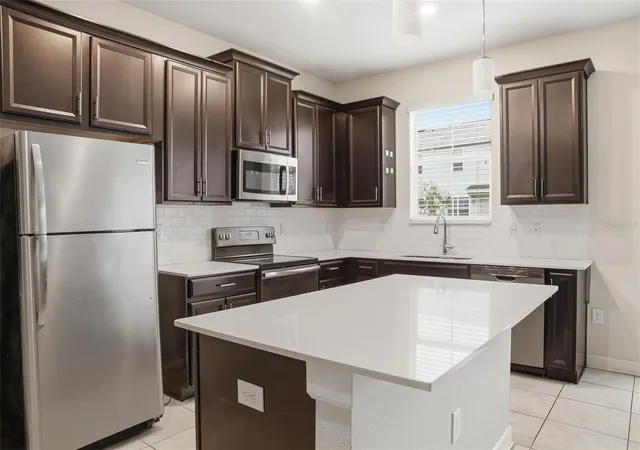 Photo 4 of Townhouse for sale at 4767 Tribute Trl, Kissimmee, FL 34746 | MLS# O6449724 | Listing updated on 2026-10-16