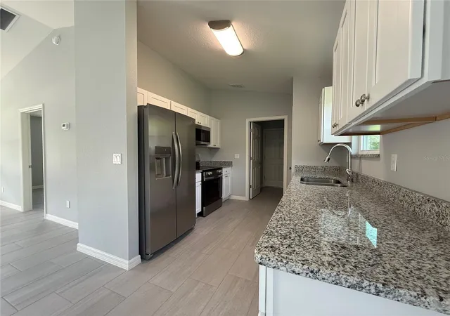 Photo 3 of Single family home for sale at 1363 NW 52nd Court, Ocala, FL 34482 | MLS# OM733991 | Listing updated on 2026-10-15