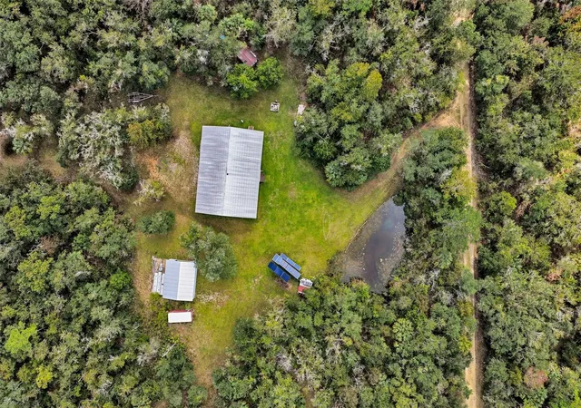 Photo 3 of Manufactured home for sale at 122 SW Tract Buck Trl Rd, Chiefland, FL 32626 | MLS# OM734005 | Listing updated on 2026-10-25