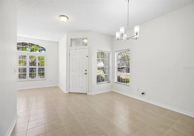 Photo 2 of Single family home for sale at 1806 Anna Catherine Dr, Orlando, FL 32828 | MLS# O6449797 | Listing updated on 2026-10-16