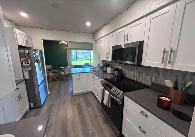 Photo 3 of Condo for sale at 4401 S Semoran Blvd #4, Orlando, FL 32822 | MLS# O6449803 | Listing updated on 2026-10-20
